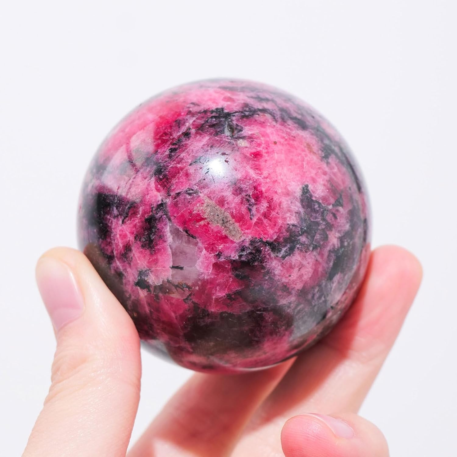 Natural Rhodonite Crystal Ball with Wood Stand